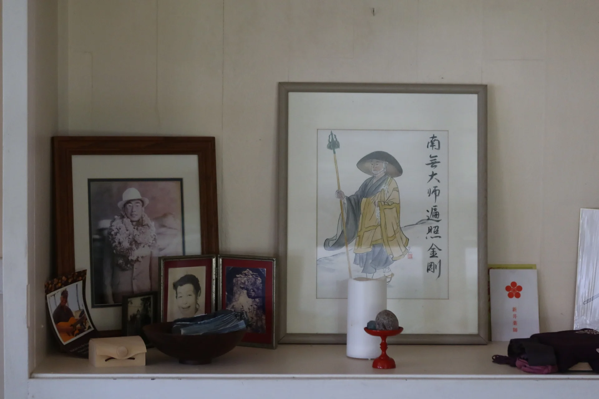 Close view of the zendo altar with offerings and incense